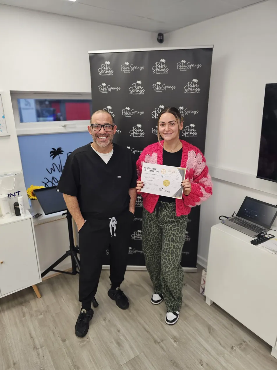 Graduate with her certificate